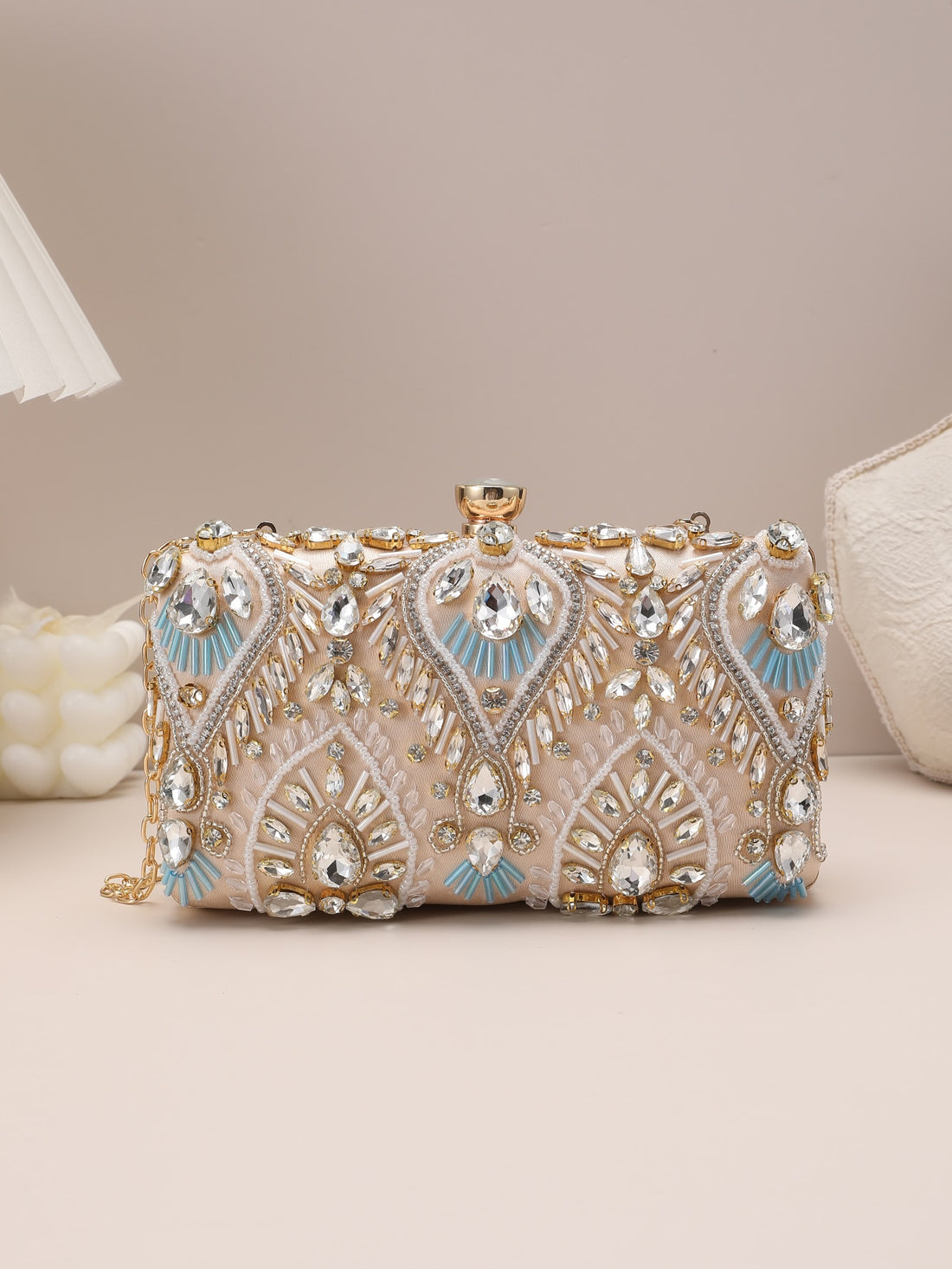 Add a touch of glamour to your outfit with our Sparkle & Shine Mini Rhinestone Clutch Bag. This elegant accessory is perfect for glamorous nights out. The mini size allows for maximum portability while the rhinestone design adds a touch of sparkle to any outfit. Elevate your style with this must-have accessory.
