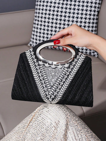 Exude glamour and stand out at any evening party or special event with our Sparkle and Shine: Glitter Handbag. With its shimmering glitter design, this handbag will add a touch of elegance and style to any outfit. Perfect for any occasion, it's a must-have accessory for those who want to shine bright.