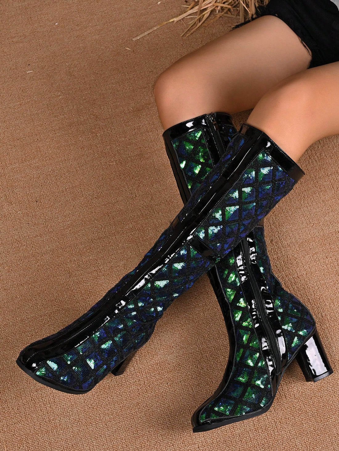 Elevate your party and winter look with our Sparkle and Shine sequin patched over-the-knee boots! The perfect balance of glamour and warmth, these must-have boots will have you shining all season long. With their eye-catching design and comfortable fit, you'll be the talk of the town at any event.