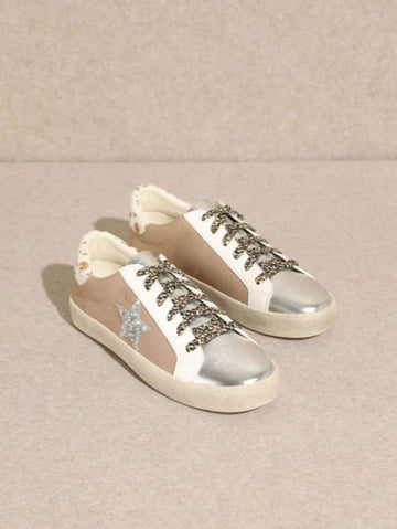 Step out with sparkle and sass in these Star Rhinestone Leather Sneakers. Crafted from smooth leather and adorned with dazzling star-shaped rhinestones, they add a playful pop to any outfit. Perfect for those who love to shine while staying comfy and chic, these sneakers bring a fun, fashionable twist to your everyday look.