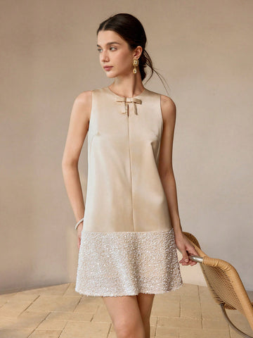This stylish Sparkling Bow Front Mini Dress will make you shine at your next event. Crafted with a bow front detail, it features dazzling sparkles that will catch everyone's attention. Designed to make a statement, this dress is perfect for any occasion, giving you a confident and glamorous look.