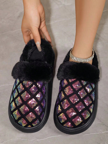 These Sparkling Comfort slip-on house slippers will keep your feet warm and cozy with their warm lining. The glitter-embellished design adds a touch of glamour to your loungewear. Experience comfort and style in these fashionable slippers.