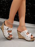 Introducing our Sparkling Crystal Wedge Sandals: Plus-Size Butterfly Rivet Straps. Elevate your style with these stunning sandals, featuring sparkling crystals and butterfly rivet straps. Designed for comfort and style, these sandals are perfect for any occasion. Step out in confidence and make a statement.