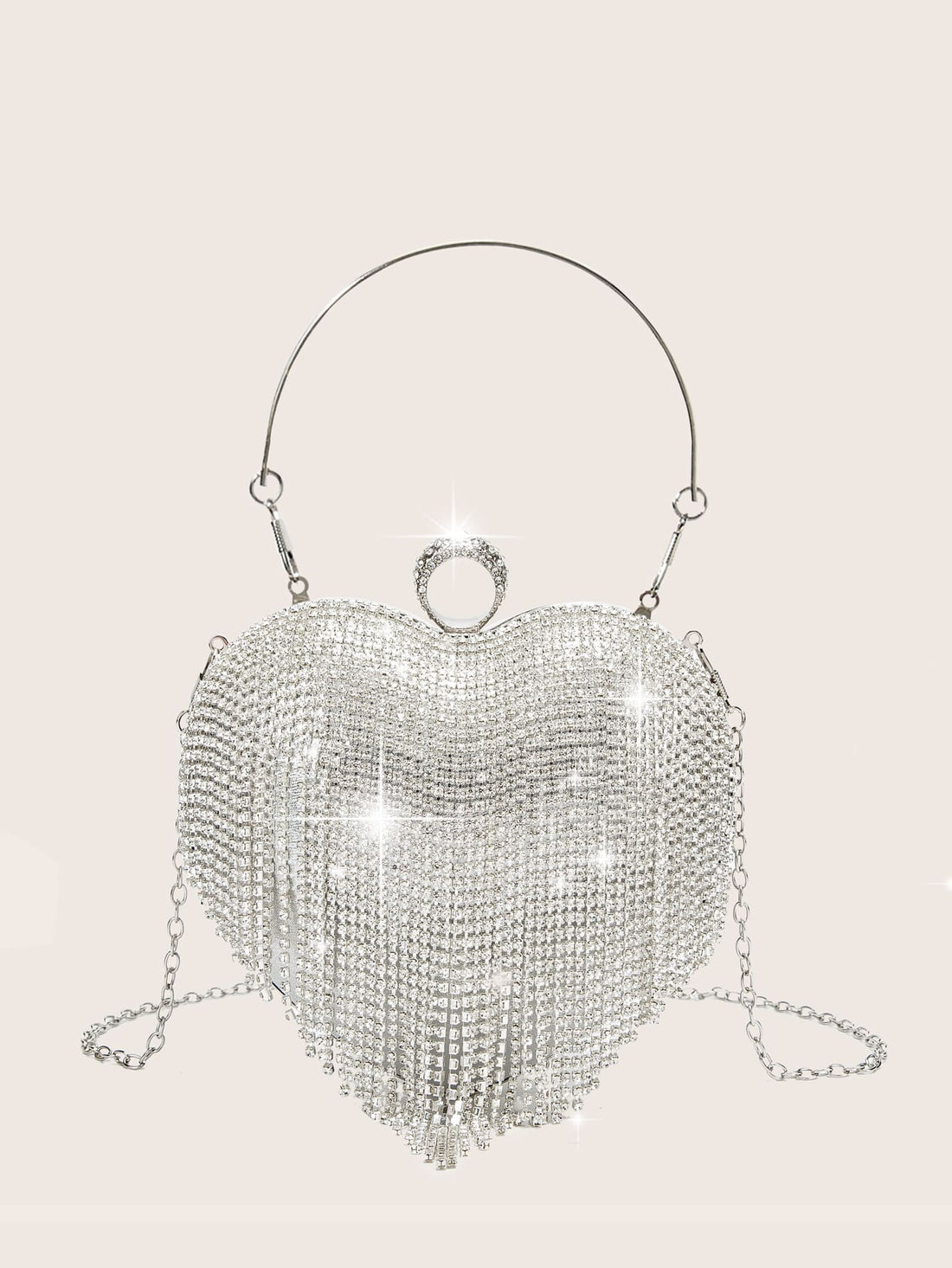 Sparkling Elegance: Carry this glamorous rhinestone evening bag to elevate any special occasion outfit. The shimmering rhinestones and elegant design will surely make a statement, while the compact size and secure closure offer convenience and peace of mind. A must-have for every formal event.