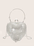 Sparkling Elegance: Carry this glamorous rhinestone evening bag to elevate any special occasion outfit. The shimmering rhinestones and elegant design will surely make a statement, while the compact size and secure closure offer convenience and peace of mind. A must-have for every formal event.