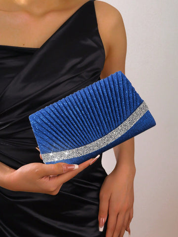 Introducing the Sparkling Elegance evening bag, the perfect accessory to add some glamour to any outfit! This miniature bag features stunning glitter and rhinestone decorations, making it a sparkling statement piece. Elevate your evening look with this elegant and eye-catching bag.