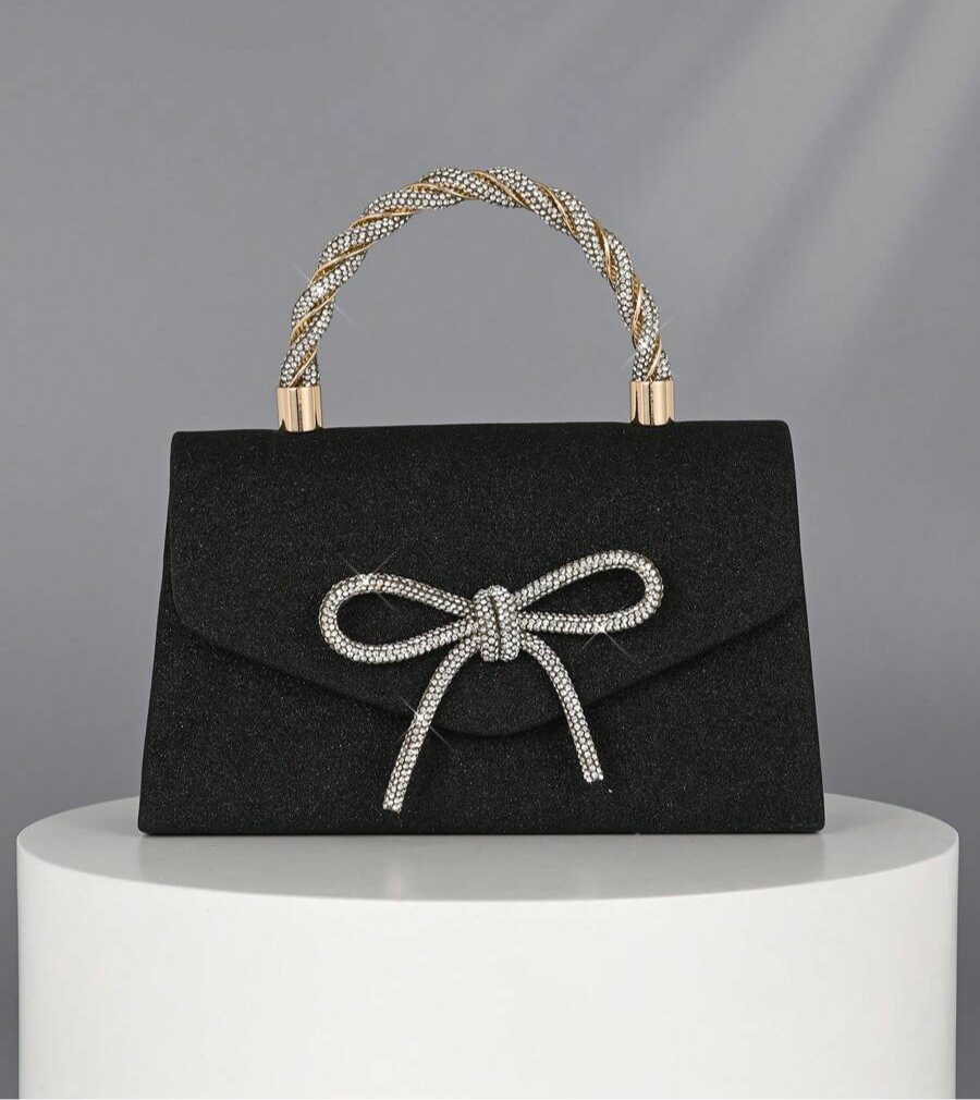 Add a dazzling touch to your evening with this Sparkling Gold Clutch. Covered in shimmering crystals, it’s the perfect playful companion for parties, weddings, or any night you want to shine bright. Compact yet spacious enough for your essentials, this handbag makes every moment feel like a celebration.