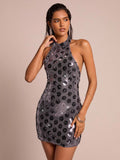 Dazzle in this show-stopping halter neck mini dress that's ready for any celebration! The sparkling embellishments catch the light beautifully, making you the star of autumn gatherings, Halloween parties, and festive Christmas events. The flattering halter neckline offers elegant support while the mini length keeps things fun and flirty. Whether you're hitting a holiday bash or ringing in the season with style, this dress delivers glamour without the fuss. Slip it on, strike a pose, and let the sparkle do t