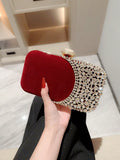 Elevate your formal attire with the Sparkling Moonlit Eve Clutch. This elegant evening bag features rhinestone embellishments, adding a touch of sparkle to your ensemble. Perfect for special occasions, this clutch exudes sophistication and style. Complete your look with this exquisite accessory.