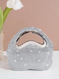 Get ready to make a statement with our stunning Sparkling Rhinestone Clutch! Perfect for glamorous nights out, this evening handbag adds a touch of luxury to any outfit. Its sparkling rhinestones will catch everyone's eye, making you feel like the star of the night. Elevate your style with this must-have accessory!