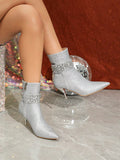 Elevate your style with these Sparkling Rhinestone Pointed Toe High Heel Boots. The dazzling rhinestones add a touch of glamour, while the pointed toe and high heel give a chic and sophisticated look. Perfect for parties, gatherings, and weddings, these boots are sure to make a statement wherever you go.