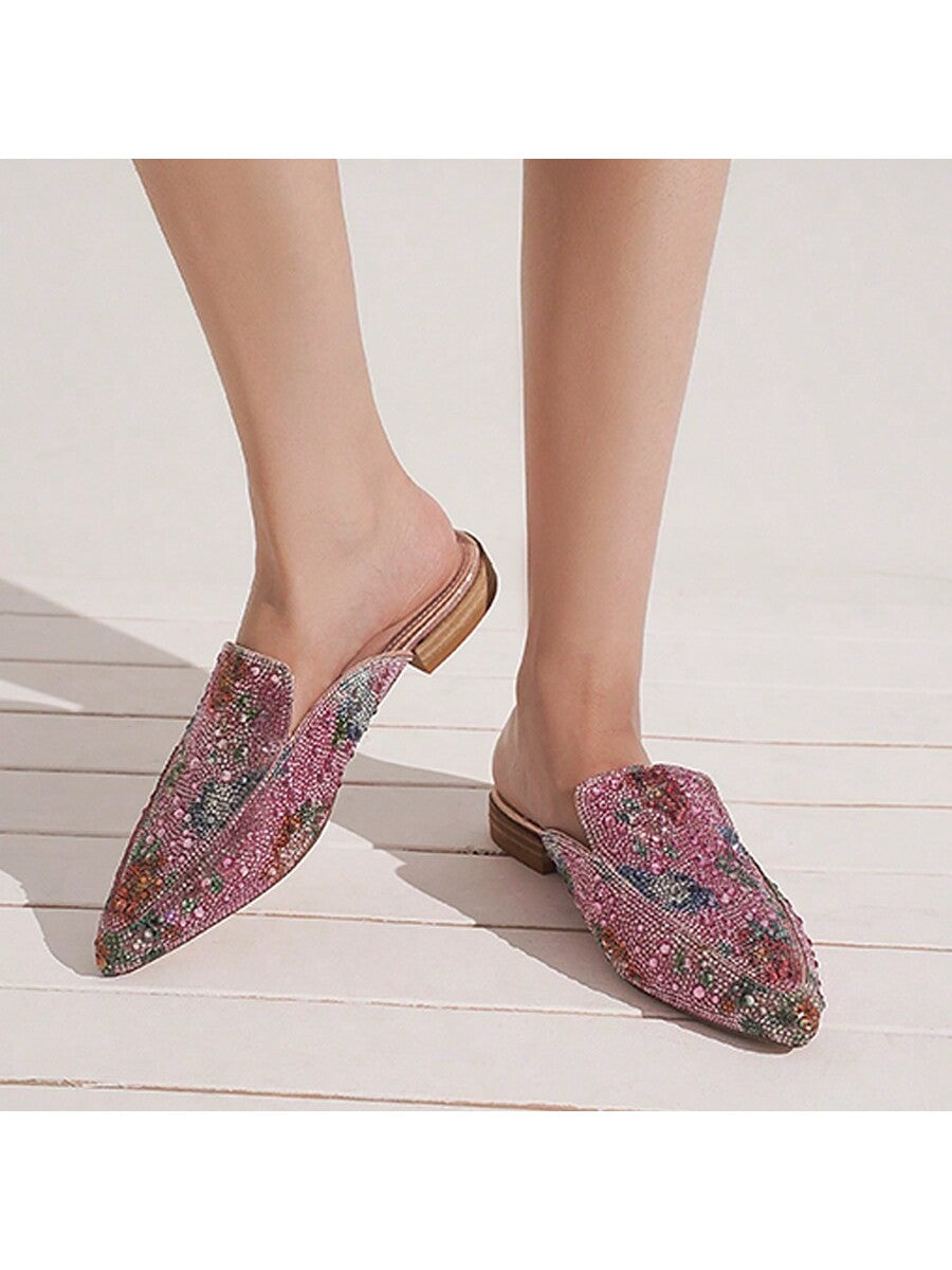 Add a touch of sparkle to your shoe collection with our Slip-On Mules. Made for the chic and fashion-forward woman, these pointed toe backless loafers feature sparkling rhinestones. Slip them on for effortless style and a touch of whimsy. (P.S. - They're also perfect for dancing the night away!)
