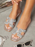 Step into style with Sparkling Silver Stride: Chic Flat Sandals for Women. These shimmering sandals add the perfect touch of elegance to any outfit. Crafted with high-quality materials, they are not only fashionable but also durable. Make a statement and feel confident in every step with these chic flats.