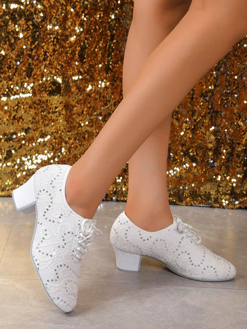 Shake up the dance floor in these sparkling white sequin dance shoes. With a cozy fur sole and non-slip design, you'll cha-cha and salsa with ease. Perfect for Latin performances and adding some pizzazz to your dance routine. Step into style and let your feet do the talking!