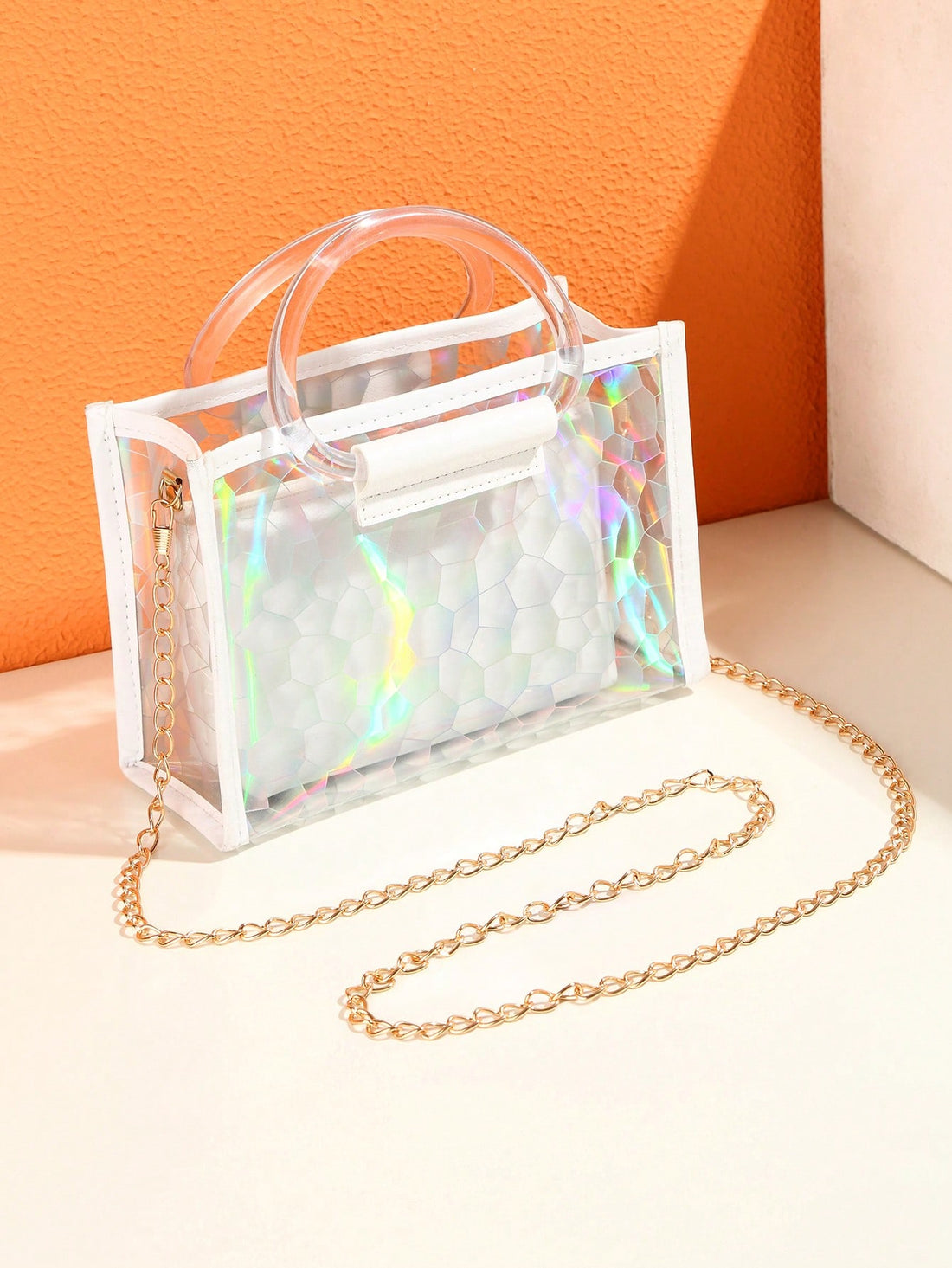 With our Sparkling White Stadium-Approved Transparent Bag, you'll never have to sacrifice style for safety. Our bag is perfect for concerts and sports events, keeping your essentials in plain sight and accessible. With its sparkling white design, it's the ultimate accessory for women who want to stay fashionable while complying with venue regulations.