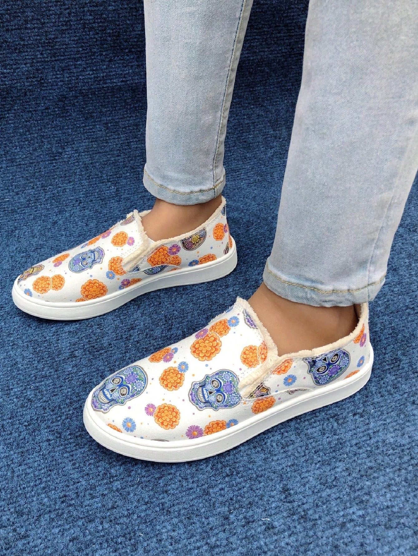 These Spooky Chic Halloween Canvas Slip-On Sneakers are the perfect addition to your fall wardrobe. Not only are they stylish and on-trend with their Halloween-themed design, but they are also incredibly comfortable and breathable, making them ideal for all-day wear. 