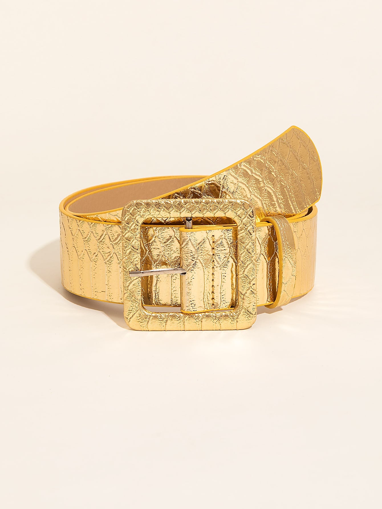 Add a touch of spooky-chic style to your Halloween party outfit with our Snakeskin Embossed Square Buckle Belt. Made with high-quality material, this belt features a unique snakeskin embossed design that is sure to make a statement. Pair it with your favorite costume or everyday attire for an extra dose of Halloween flair.