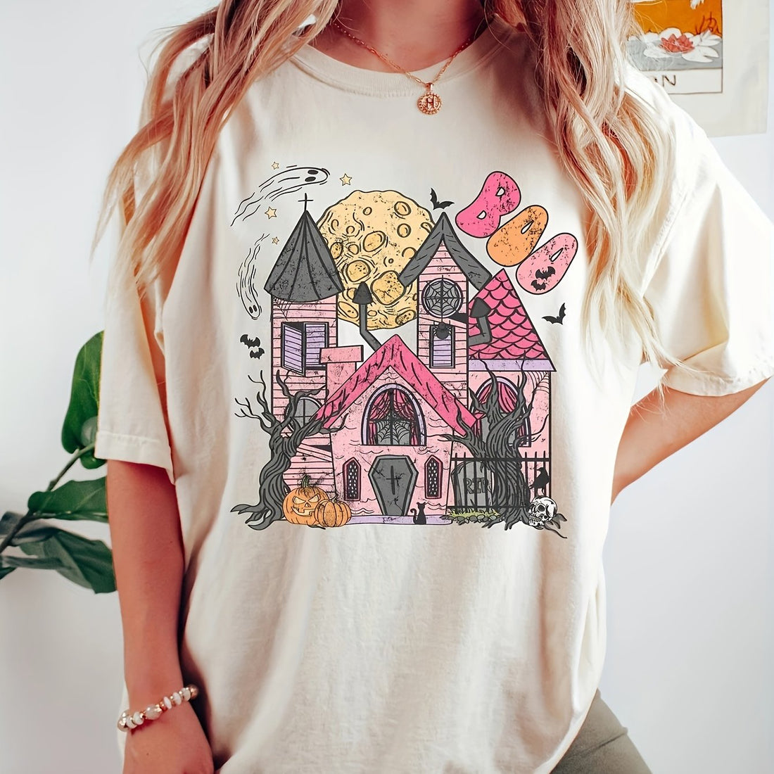 This Spooky Halloween House Neck T-Shirt is designed specifically for women, providing a comfortable and casual top option. Its spooky house design adds to the Halloween spirit, making it a perfect choice for the season. Made with quality materials, it ensures durability and comfort for everyday wear.