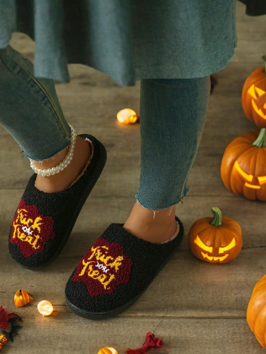 Stay cozy and get in the Halloween spirit with these Spooky Trick or Treat Funny Slippers. Perfect for both men and women, these limited edition slippers feature a unique and humorous design. Bring some spookiness to your feet and enjoy the comfort of these slippers during the holiday season.