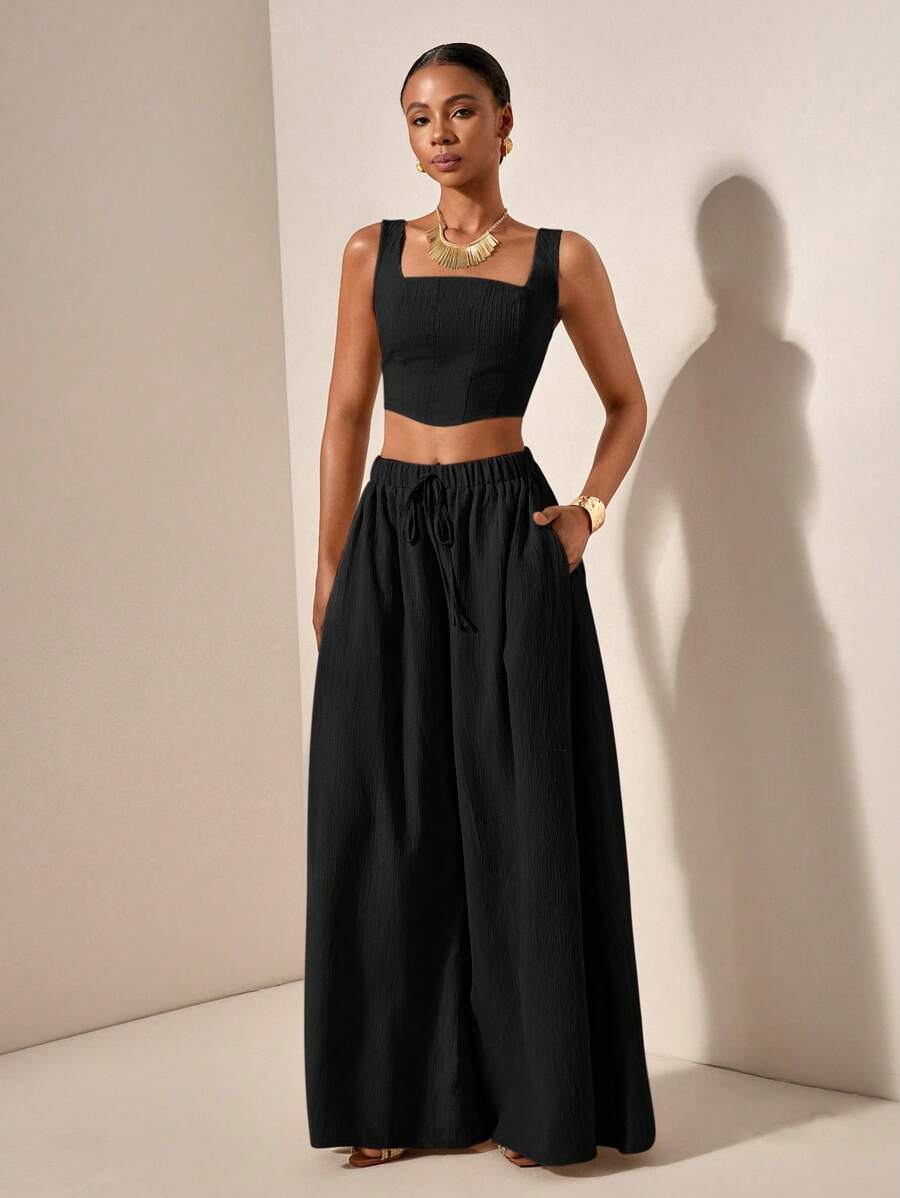 Elevate your warm-weather wardrobe with these breezy wide-leg trousers that practically float when you walk. The fishbone suspender detail adds a quirky, vintage-inspired twist that'll have everyone asking where you found them. Lightweight fabric keeps you cool while the roomy cut ensures maximum comfort—no more tugging or adjusting. Bonus: functional pockets mean you can actually carry your stuff. Perfect for casual outings, weekend adventures, or whenever you want to look effortlessly put-together without