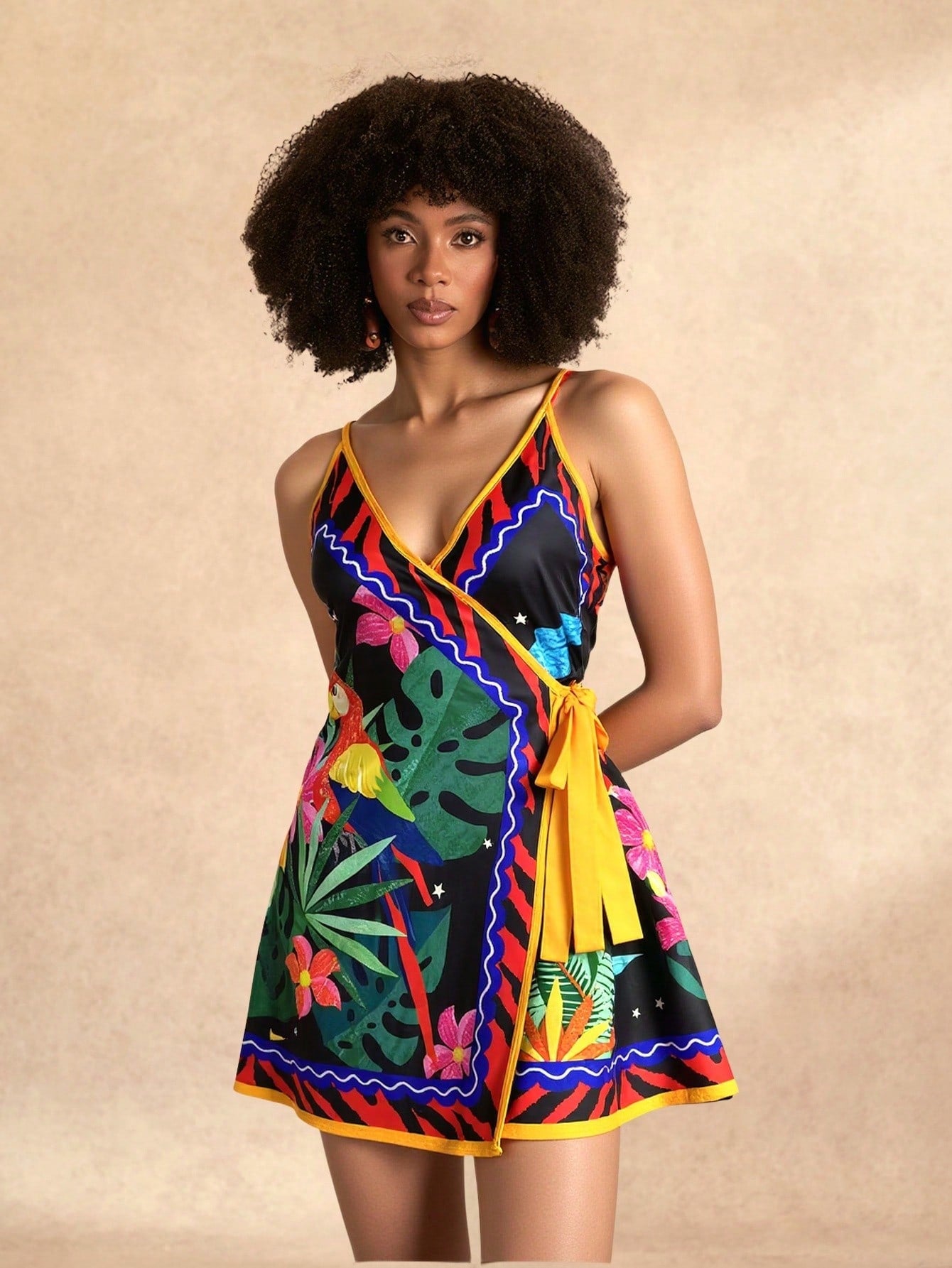 Embrace sunny days in this playful Spring/Summer dress featuring delicate spaghetti straps and a trendy print that turns heads. The tie-wrap hem adds a flirty twist, letting you adjust the fit for comfort and style. Perfect for casual outings or weekend adventures, this dress keeps you cool and effortlessly chic all season long.