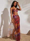 Embrace effortless coastal style with this Spring & Summer beach dress, designed for warm-weather getaways. Crafted from breathable knitted mesh, it features a vibrant printed pattern that captures the spirit of vacation. The flattering slit detail adds movement and elegance, making it perfect for beach strolls, seaside dinners, or resort lounging. 