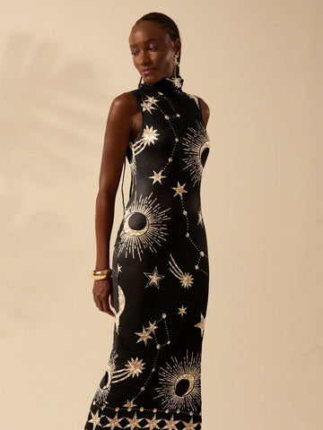 Unleash your inner dreamer with Starlit Dreams! This boho black dress features a playful star and moon print, perfect for adding a touch of effortless style to any outfit. Embrace your free spirit and shine bright in this tropical dress. (Dreams sold separately)