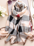 Stay stylish and protected from the sun with our Silky Touch Beach Cover-Up. Made with high-quality materials, this British-style long scarf will keep you chic and comfortable all day. Enjoy the benefits of both fashion and function with our versatile and elegant cover-up.