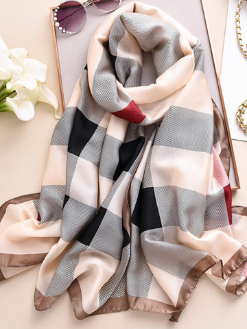 Stay stylish and protected from the sun with our Silky Touch Beach Cover-Up. Made with high-quality materials, this British-style long scarf will keep you chic and comfortable all day. Enjoy the benefits of both fashion and function with our versatile and elegant cover-up.