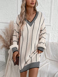 Stay warm and stylish with our Striped Drop Shoulder Sweater Dress. Featuring a unique drop shoulder design and classic stripes, this dress is perfect for any occasion. Made with high-quality materials for ultimate comfort. Elevate your winter wardrobe today!