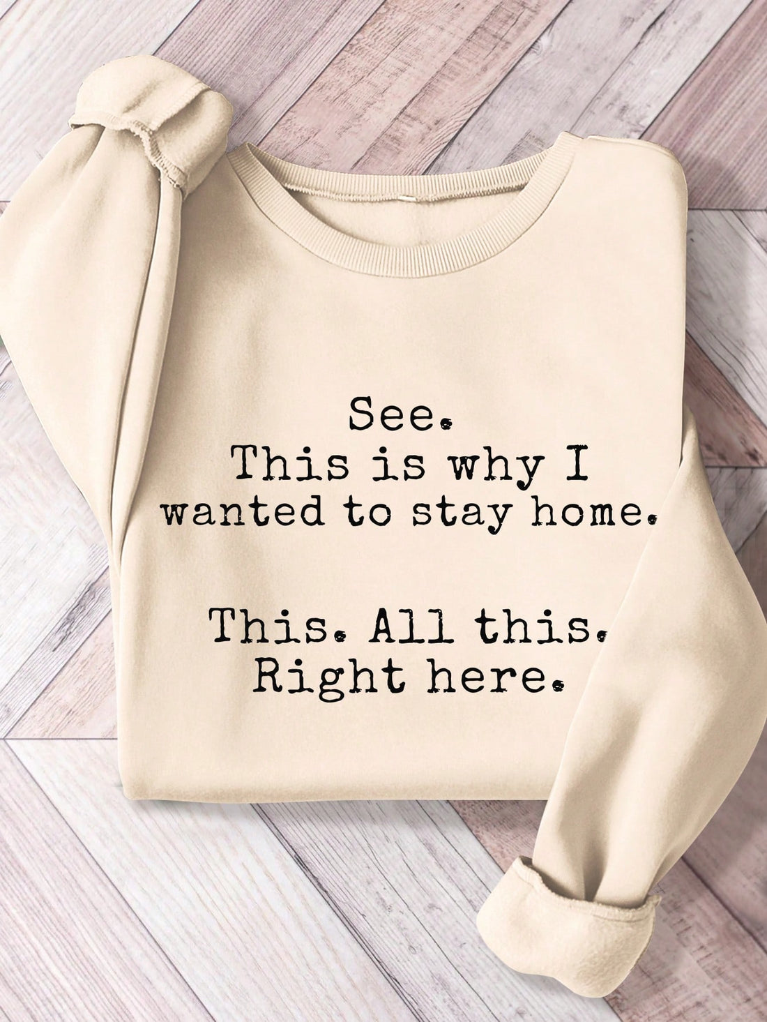 Stay chic while staying home in our 'This Is Why I Want to Stay Home' sweatshirt. Made with comfort and style in mind, this sweatshirt features a casual graphic design that reflects our current lifestyle. Embrace your inner homebody and rock this quirky and playful sweatshirt.