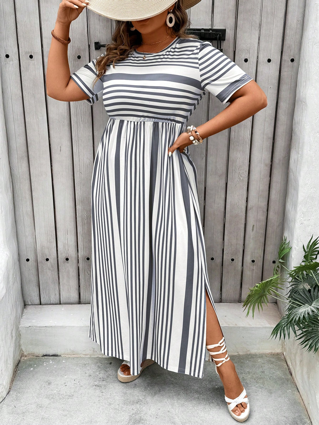 Stay chic all summer long in this boho-inspired plus size dress! Featuring vibrant stripes and a flirty side slit, this casual dress is perfect for any occasion. Stay stylish and comfortable with its flowy fit and lightweight fabric. Get ready to turn heads and feel confident in this must-have summer staple!