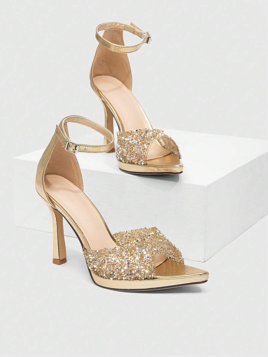 Make a statement at every event with these stunning leopard print high-heel party shoes. Featuring eye-catching rhinestone embellishments that catch the light with every step, these heels deliver bold glamour and undeniable style. The classic leopard pattern pairs perfectly with any outfit, while the elevated heel adds confidence and elegance to your silhouette. 