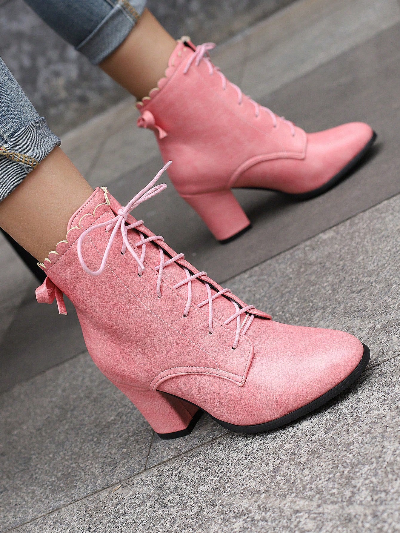 Elevate any outfit with these stylish Pink Bowknot Pointed Toe High Heel Ankle Boots. The sleek pointed toe design adds a touch of sophistication, while the bowknot detail adds a feminine touch. With a comfortable high heel, these boots are perfect for stepping out in style.