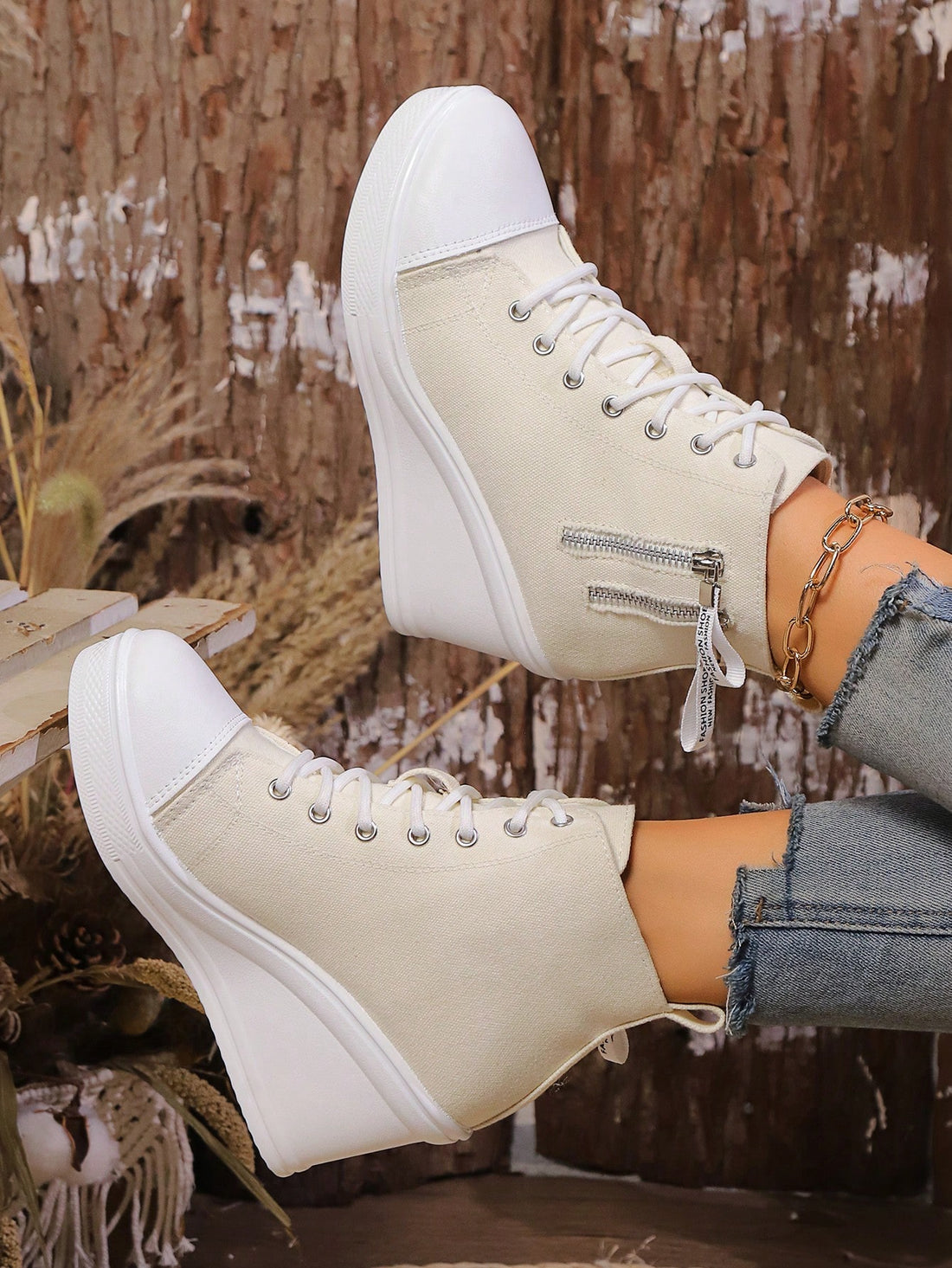 Elevate your style game with these Women's Casual Canvas Hidden Wedge Sneakers! Featuring a thick platform sole, these shoes add both height and comfort to your look. Step up your fashion game with this versatile and trendy footwear.