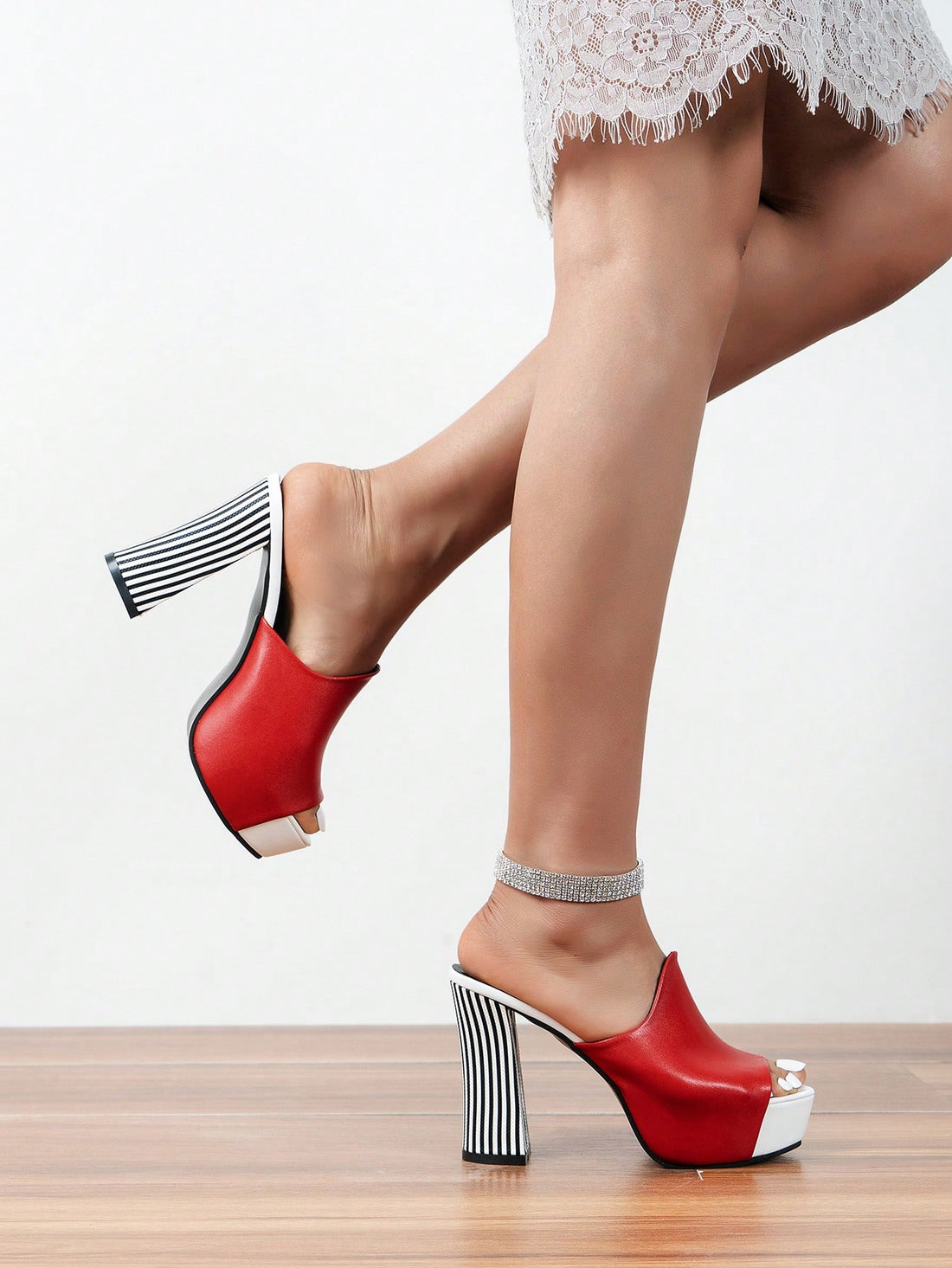 Elevate your fashion game with these Peep Toe Thick Sole High Heel Sandals for women. The chunky heel provides extra stability and support, while the open toe design adds a touch of chic. Perfect for any occasion, these sandals will add height and style to your outfit.