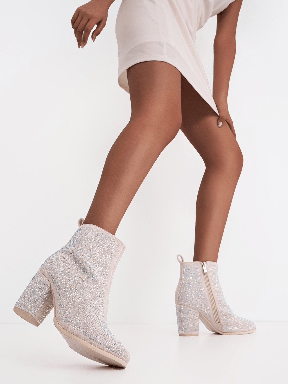 Upgrade your shoe game with Step into Style: Fashionable Women's Dressy Ankle Boots. These stylish booties feature a trendy block heel for added height and support. Perfect for dressing up any outfit, these boots will take your fashion game to the next level.
