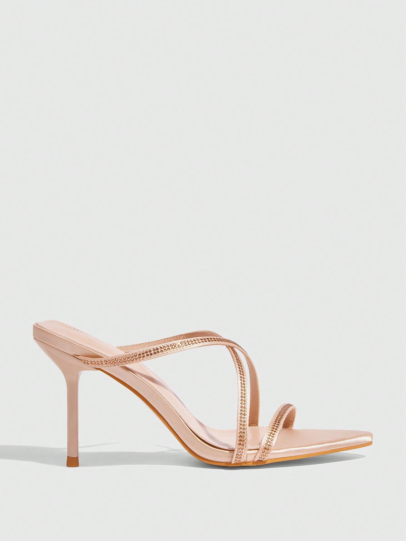 Step into summer with these chic pointed toe stiletto sandals, perfect for turning heads on warm nights and vacation getaways. Their sleek design adds a playful touch to any outfit, elevating your style effortlessly. Whether dancing under the stars or strolling seaside, these heels bring confidence and flair to every step.