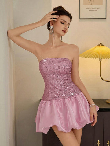 Front view of pink strapless sequin patchwork evening gown