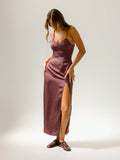 Step into the spotlight with this Strappy Silky Split Front Dress, designed to turn heads with every step. Its silky fabric glides over your skin, while the daring front split adds just the right amount of sass. Perfect for glamorous evenings, this dress pairs effortless style with a playful edge—making sure you’re the life of the party all night long.
