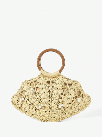 Beige straw shell shaped beach bag with brown round handle pearl and shell charms