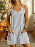 Get ready to rock this Striped Crew Neck Casual Sleeveless Pocket Dress! This dress packs a punch with its playful stripes and convenient pockets. Perfect for any casual outing, and sure to keep you looking and feeling cool. (Strip away the competition with this dress!)