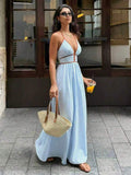 Turn heads with this effortlessly chic striped halter maxi dress, designed for sunny beach days, tropical vacations, and warm-weather celebrations. The flattering deep V-neckline and halter design create a feminine silhouette, while the flowing maxi length offers graceful movement with every step. Lightweight and breathable, this dress keeps you comfortable whether you're strolling along the coast, attending a summer party, or enjoying a sunset dinner. 