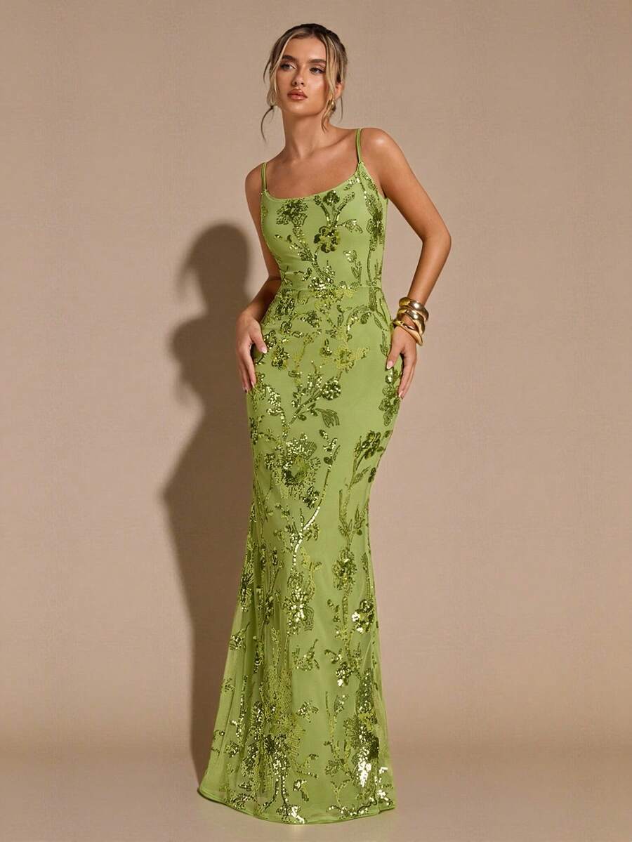 Elevate your special occasion wardrobe with this stunning green maxi dress. Featuring intricate 3D floral embroidery and delicate sheer detailing, this piece combines elegance with modern flair. The backless design with tie straps creates a sophisticated silhouette, while the high-waisted mermaid hem flatters your figure. Lined for comfort and crafted from a premium polyester-elastane blend, it's perfect for weddings, formal events, and unforgettable celebrations. Hand wash to maintain its beauty.