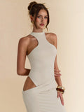 Elevate your summer style with this eye-catching peach jumpsuit dress! The sleeveless design and asymmetric cut-outs create a playful silhouette that's sure to turn heads. Perfectly fitted to flatter your figure, this versatile piece transitions effortlessly from beachside resorts to wedding celebrations. Pack this stunner for your next getaway and watch the compliments roll in!