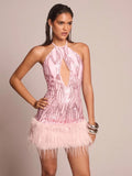 Shine bright like a diamond in this show-stopping pink sequin mini dress! Featuring a chic halter neck design and luxurious furry trim, this dress is your ticket to turning heads at any celebration. The shimmering sequins catch the light with every move, while the playful silhouette keeps things fun and flirty. Whether you're dancing the night away at a party or celebrating in style, this dress delivers major glam with an effortless vibe. Perfect for anyone ready to sparkle and make a statement!
