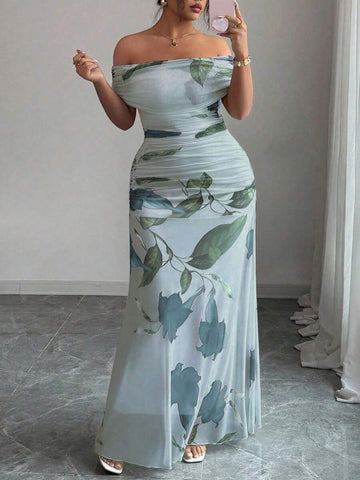 Make a statement in this show-stopping plus-size evening dress that celebrates your curves with style. The off-shoulder neckline creates an effortlessly chic silhouette, while strategic ruching flatters your figure beautifully. Delicate mesh print detailing adds visual interest and sophistication to every angle. Perfect for galas, weddings, or any occasion where you want to feel absolutely fabulous. Slip into confidence and let your elegance do the talking.