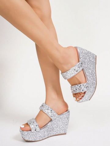 Step up your night out game with these stunning sequined wedge sandals! Not only will they elevate your style with their high-heel glam, but they'll also add a touch of sparkle to any outfit. Perfect for a night out on the town or a special occasion, these sandals are a must-have for any fashion-forward woman.