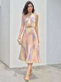 This must-have summer dress features a stunning tie-dye design and keyhole neckline, making it a perfect addition to your wardrobe. The pleated details add an extra touch of style and versatility. Elevate your summer look with this eye-catching and comfortable dress.