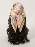 Elevate your spring wardrobe with this chic 70cm printed square scarf. Crafted for versatility, it works as a classic bandana, neck wrap, or hair accessory. The vibrant print adds instant personality to any outfit, while the generous square cut offers endless styling possibilities. Perfect for layering over dresses, tying around your bag, or wearing as a headscarf. Lightweight and easy to care for, this essential accessory transitions seamlessly from casual to polished looks. 